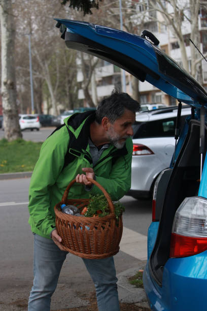 istock A senior man returns from grocery shopping 1481122303