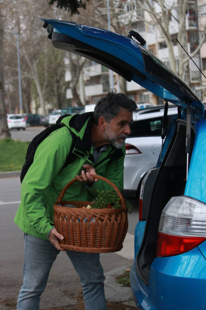 istock A senior man returns from grocery shopping 1481122324