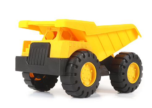 This is a plastic toy tipper truck.
