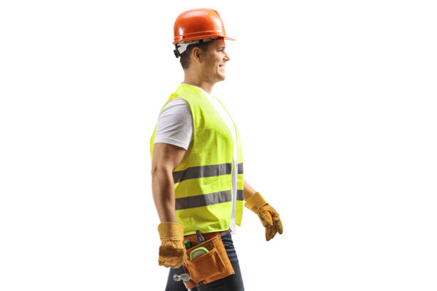 istock Profile shot of a construction worker with a helmet and tool belt walking 1481126697