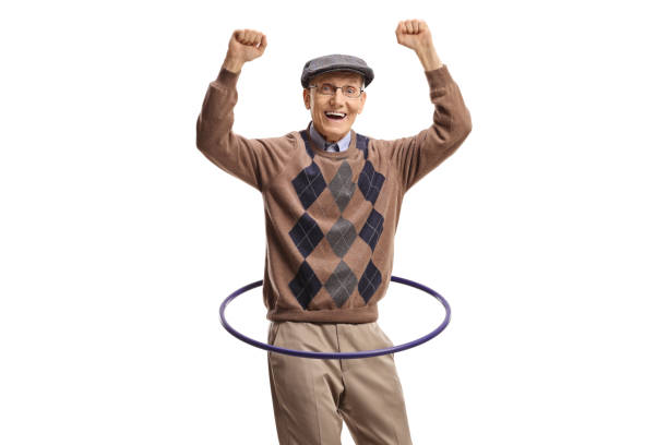 istock Happy elderly man spinning a hula hoop 1481127783