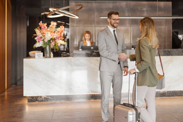 istock Greeting Each Other in Front of Hotel Reception 1481127993