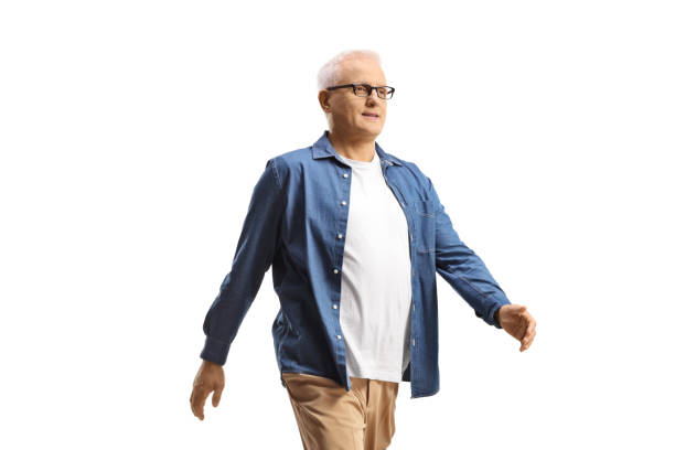 istock Mature man with glasses walking 1481128356