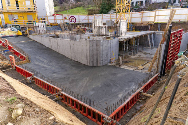Scenic view of empty construction site at Swiss town. Construction site with formwork and ramp for underground parking of apartment building at City of Zürich on a sunny winter. Photo taken March 15th, 2023, Zurich, Switzerland. concrete in formwork stock pictures, royalty-free photos & images