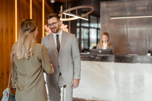 istock Greeting Each Other in Front of Hotel Reception 1481129541