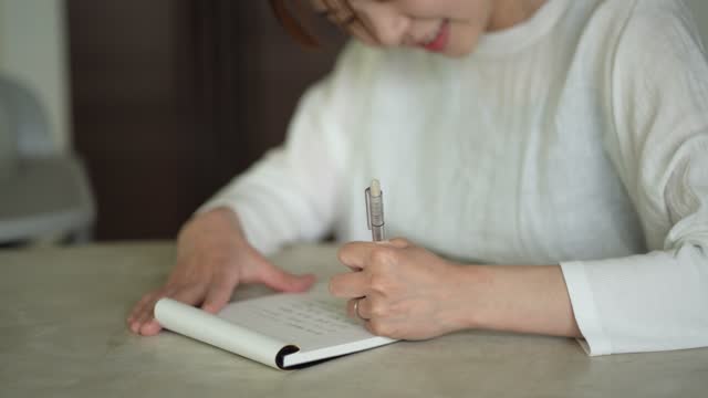 woman writing a letter