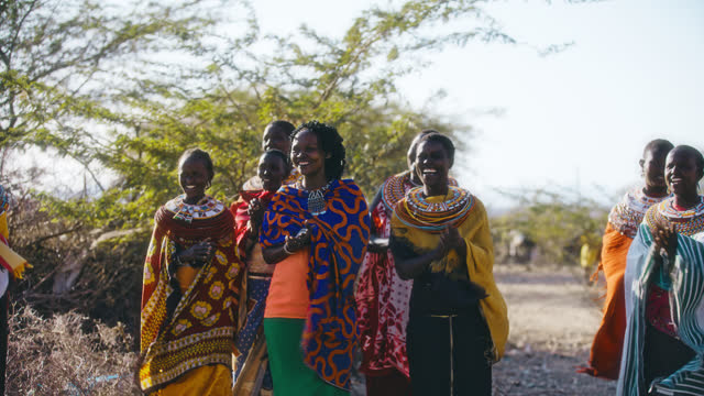 SLO MO Samburu women in local dresses performs tribal songs