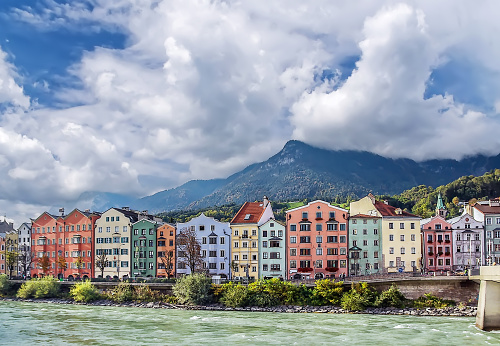 Colorful houses on Embankment of the River Inn in Innsbruck, Austria