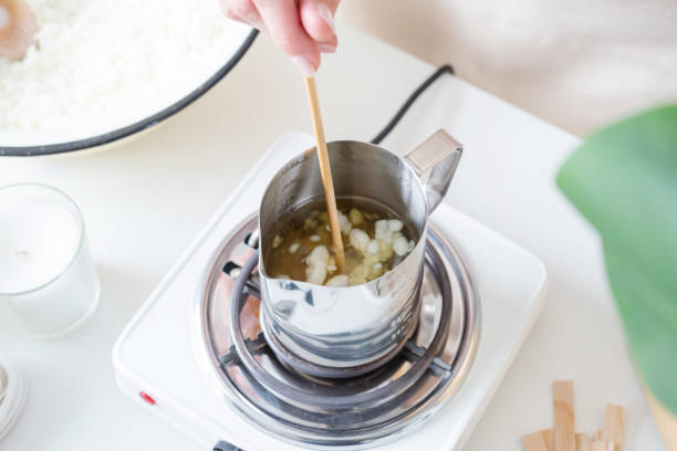 istock Woman making decorative aroma candles at table 1481137716