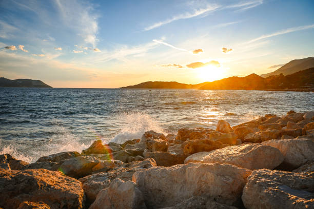 istock sunset over sea and mountain landscape 1481141958