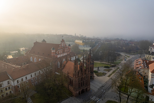 Aerial beautiful spring morning fog view of Vilnius Old Town, St. Anne's Church, Lithuania