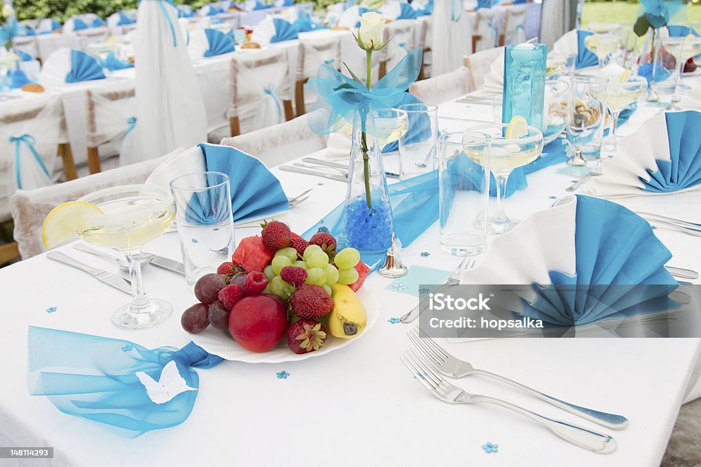 Wedding table setting Luxury wedding lunch table setting outdoors, in white and blue colors Alcohol - Drink Stock Photo