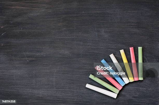 Colorful Chalk On A Blank Smudged Blackboard Stock Photo - Download Image Now - Backgrounds, Black Color, Blank