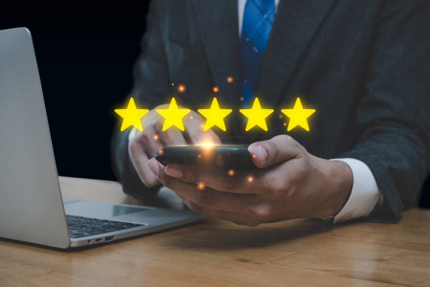 istock Good Feedback. business people using mobile smart phone with five star button to review good rating, satisfaction, customer review, digital marketing, good experience, product rating review concept 1481147570