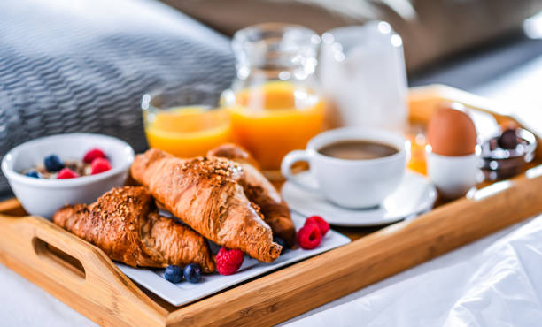 istock A tray with breakfast on a bed in a hotel room 1481151756