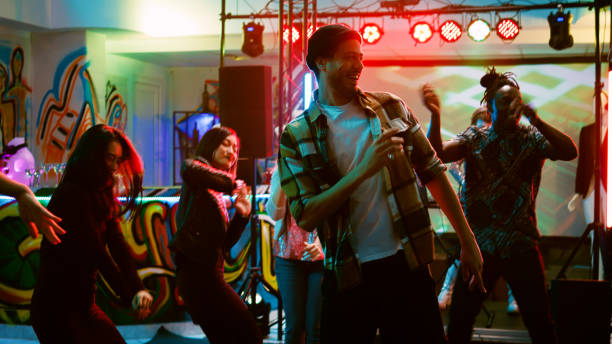 istock Young adults dancing at nightclub 1481153861
