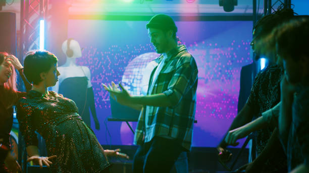 istock Young adults moving at disco party 1481154099