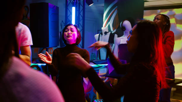 istock Young persons dancing at club 1481154497