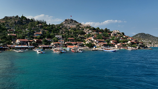 Kaleköy-Simena is a village of the Demre district in the Antalya Province of Turkey, located between Kaş and Demre, on the Mediterranean coast. The village lies amidst a Lycian necropolis, which is partially sunken underwater.
