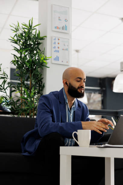 istock Arab worker using laptop to attend online meeting 1481156565