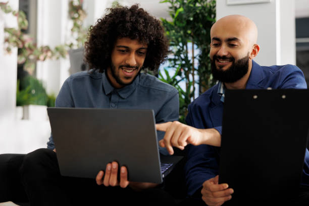 istock Businessmen collaborating on startup project and checking financial data 1481158569