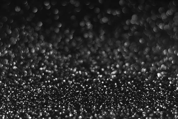 istock Gray black sparkling glitter bokeh background 1481164462