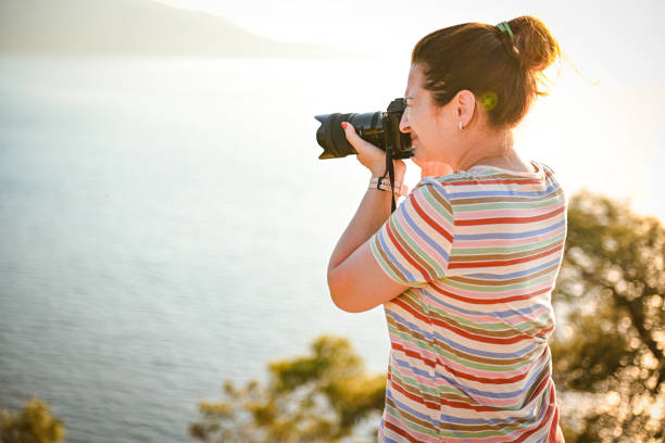 istock woman traveling the world with camera 1481165722