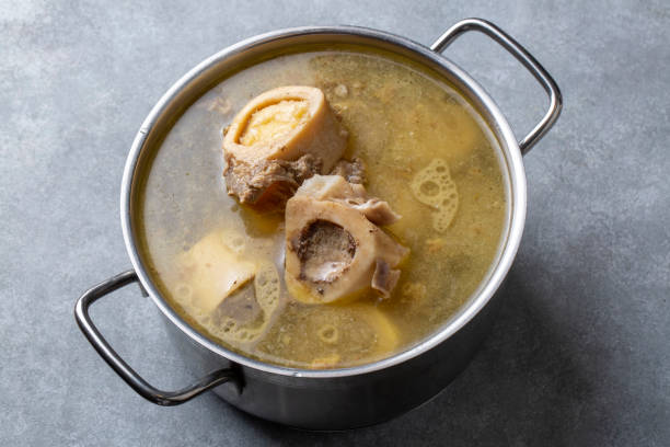 istock Boiled bone and broth. Homemade beef bone broth is cooked in a pot on. Bones contain collagen, which provides the body with amino acids, which are the building blocks of proteins. 1481166453