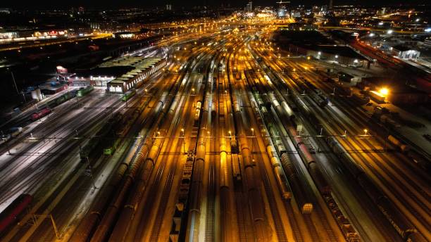 istock Night city lights over railway depot 1481168774