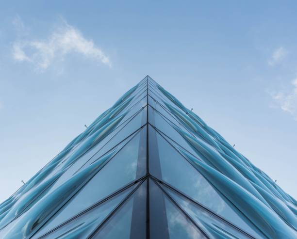 istock Towering skyscraper on the background of bright blue sky 1481171113