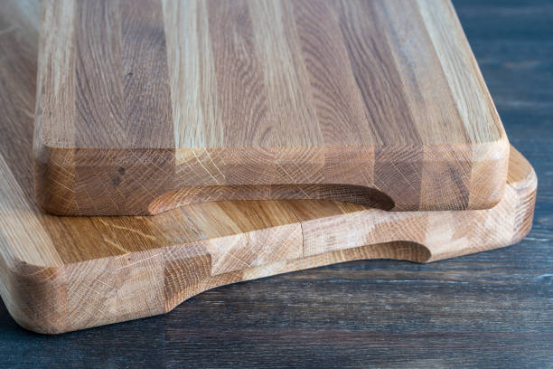 istock Two wooden cutting board on wooden table background 1481180943