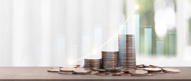 istock Stack of coin with trading graph, financial investment 1481181989