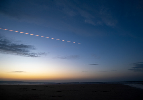 A setting sun over Saunton sands in North Devon