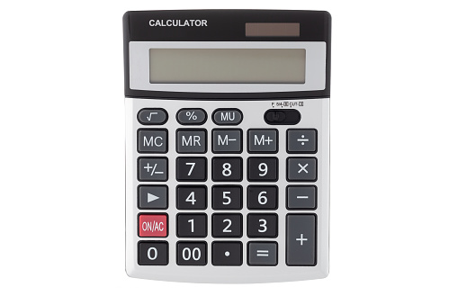Calculator on a white background and with money as a background