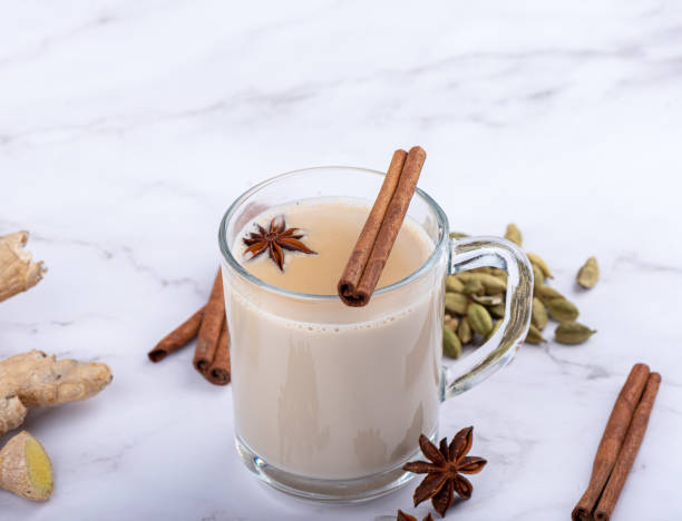 istock Close-up glass mug with masala tea and spices. 1481186627