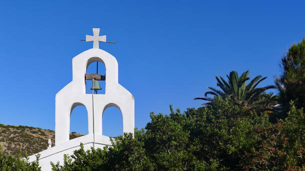 Bell Tower on a Greek Church Bell Tower ob=n a Greek Church on the Island of Naxos greek orthodox stock pictures, royalty-free photos & images