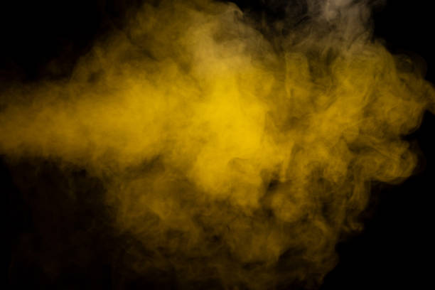 istock Yellow steam on a black background. 1481191957