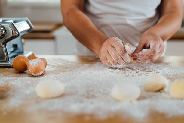 istock Woman kneading dough 1481193568