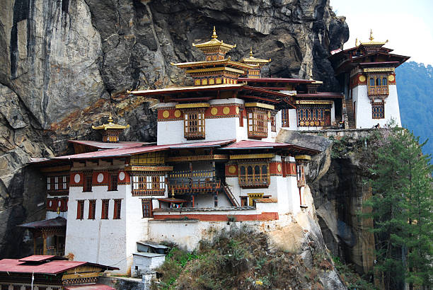 Tiger's Nest Monastery Tiger's Nest Monastery sits perched on a a cliffside in Bhutan. taktsang monastery photos stock pictures, royalty-free photos & images