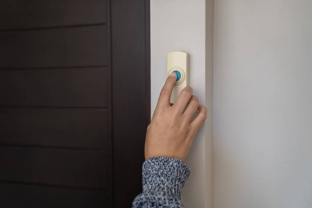istock close-up finger pressing doorbell 1481196452