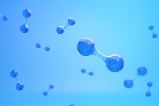 Molecule or Atom of hydrogen on blue background. Net zero and sustainable resource concept. 3D rendering.