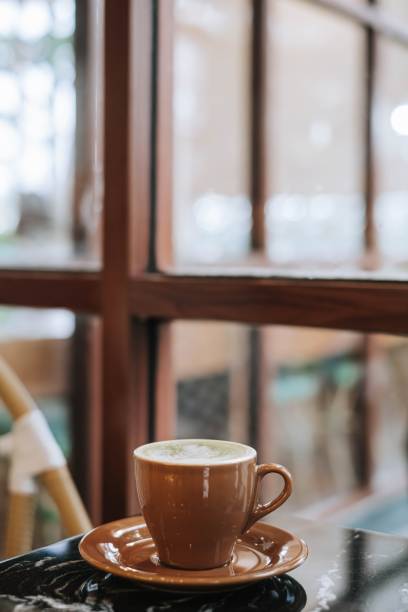 istock Matcha Latte on a black marble table near the window 1481197848