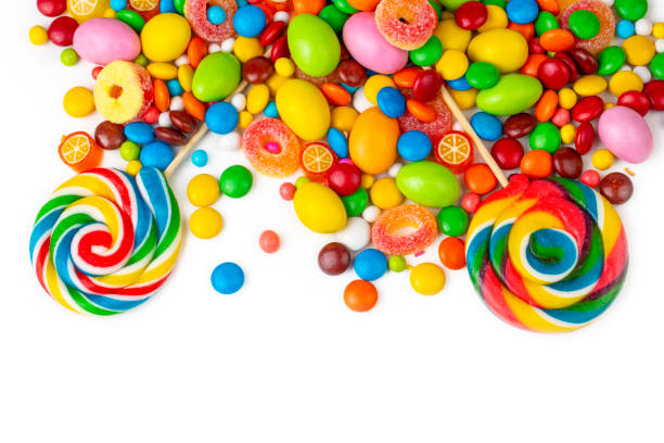 istock Colorful lollipops and different colorful round candy. Top view. 1481198454