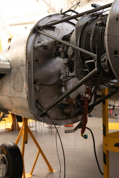 istock Part of an old and rusty small plane uncovered in a hangar 1481201129