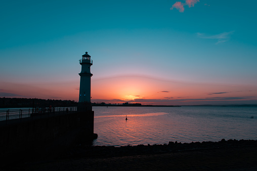 Sunset at Newhaven Harbour. Silhouette of Newhaven Lighthouse