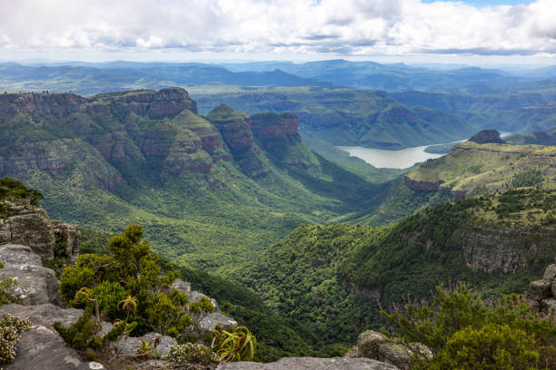 istock View down the green valley and mountains 1481203310
