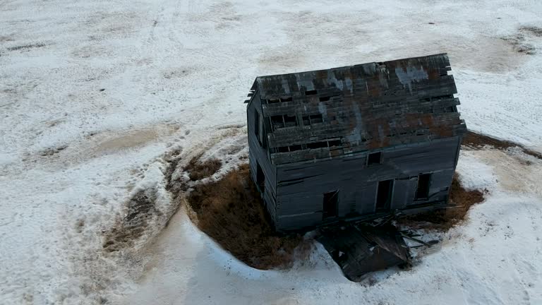 Abandoned Farmhouse on the Prairie in Springtime