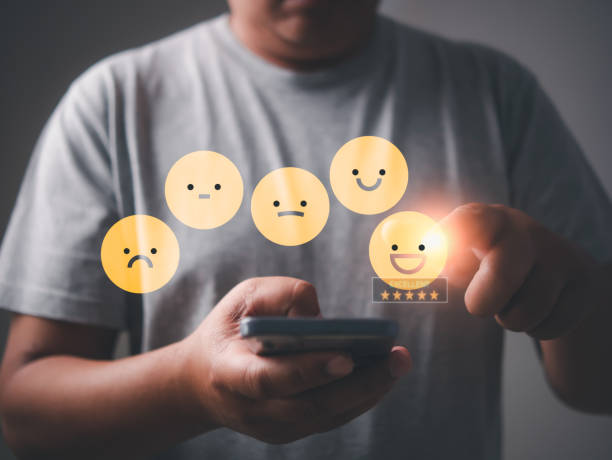 istock Customer review satisfaction feedback survey concept, User give rating to service experience on online,finger pressing emotion face emoticon on virtual touch screen. Customer service evaluation concept 1481209407