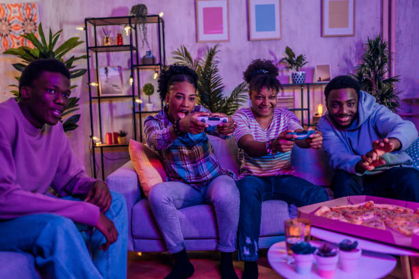 istock Friends playing video games at the apartment 1481210399