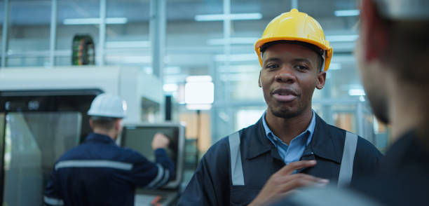 istock Diversity colleague of industry heavy team engineer. while checking and discuss maintenance machine line production factory 1481211105